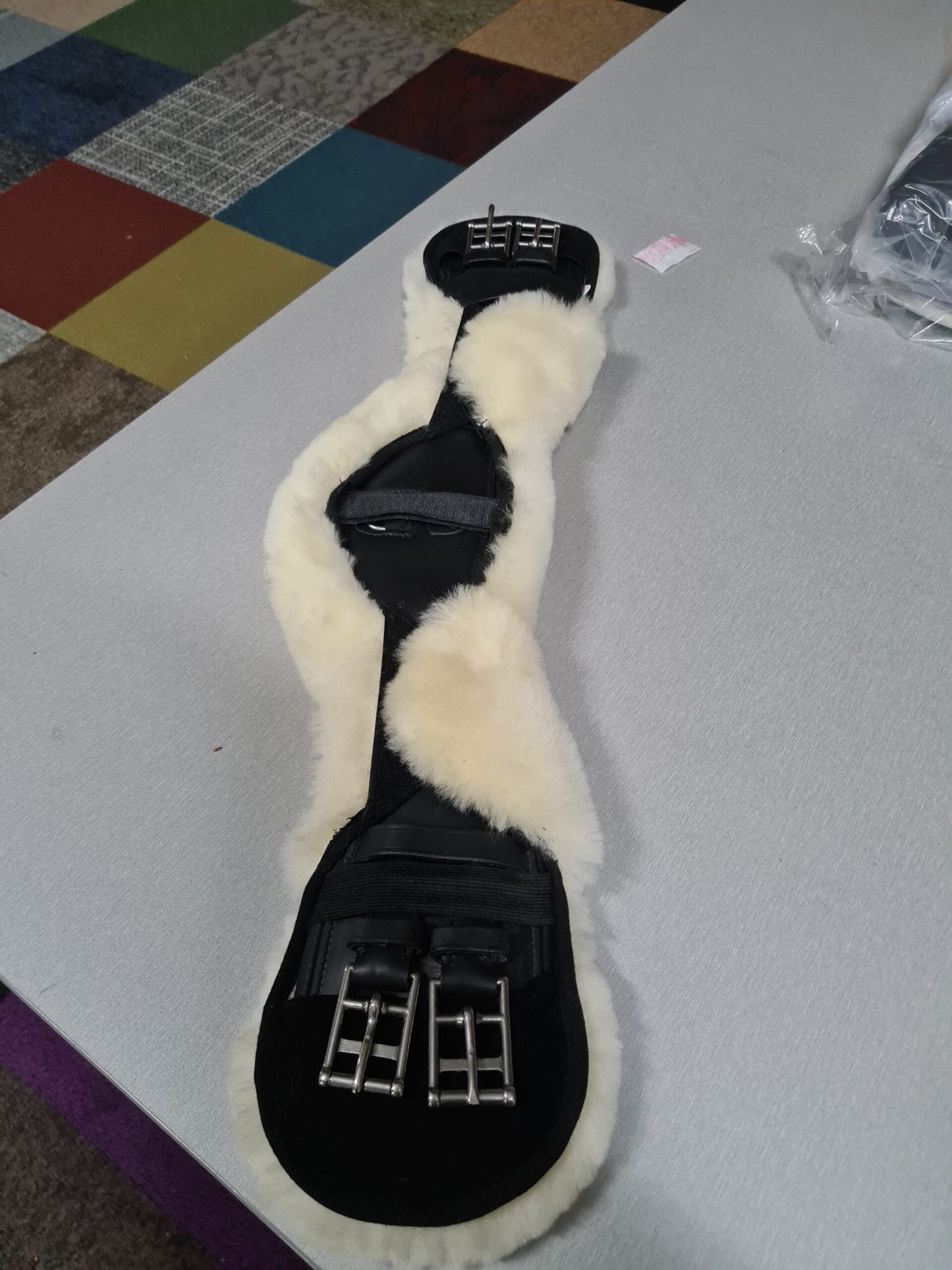 EDIX crescent girthcover of Merino sheepskin