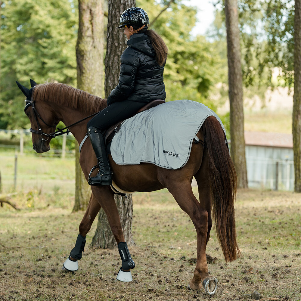 Ländtäcke med reflex